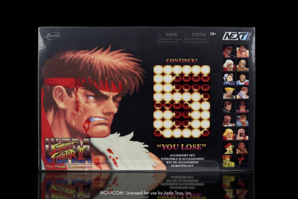 Street Fighter II – Street Fighter “You Lose” SDCC Exclusive 1:12 Accessories Pack